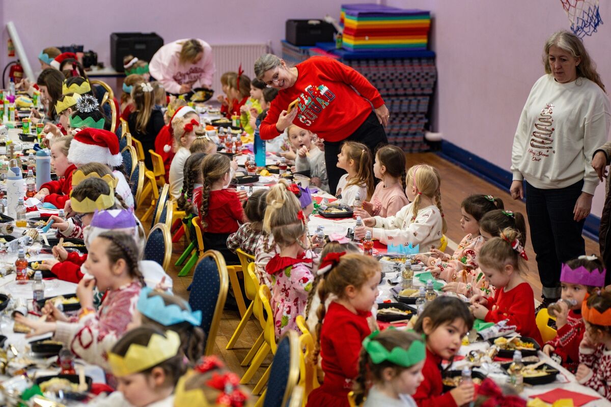 Pupils enjoy a special Christmas dinner, served up by teachers and SNAs as the school marked the festive season together.
