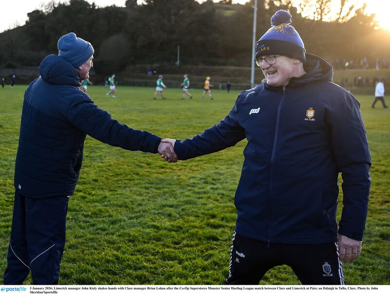Limerick manager John Kiely shakes hands with Clare manager Brian Lohan. Picture: John Sheridan/Sportsfile