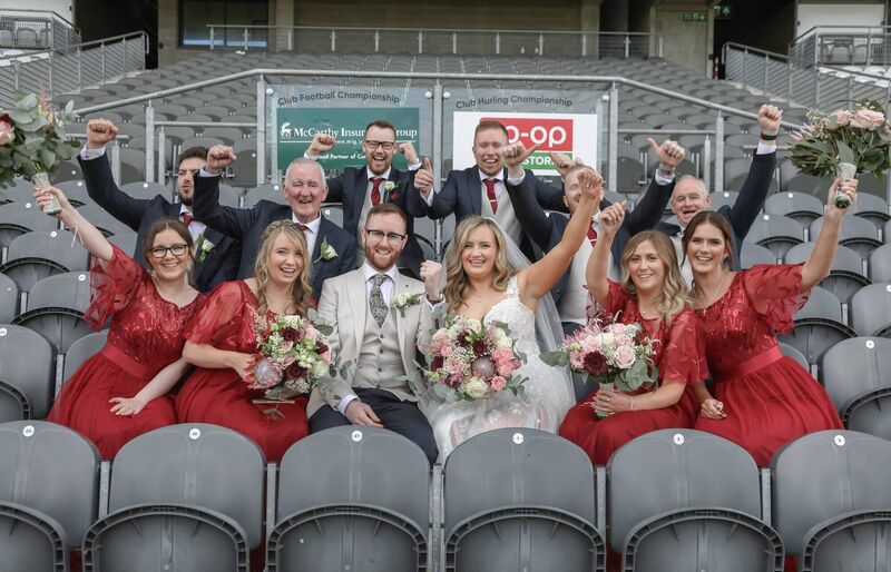 The couple with their bridal party at Páirc Uí Chaoimh. 