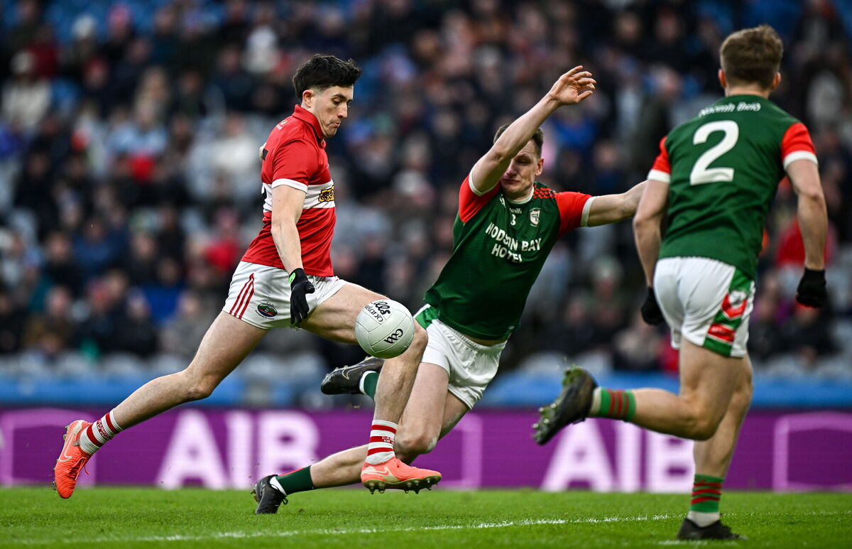 Niall Geaney of Dingle in action against Shane Cunnane of St Brigid's. Pic: Seb Daly/Sportsfile