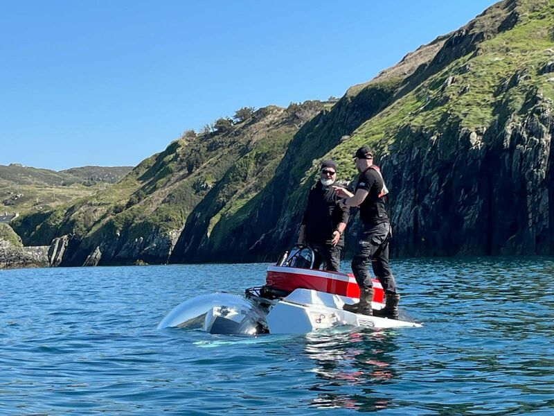 John Kearney and Michael McCarthy on Muirí Carraige Aonair Teo's latest addition, the A-EX2 sub which can accommodate three people including a pilot and two passengers. 