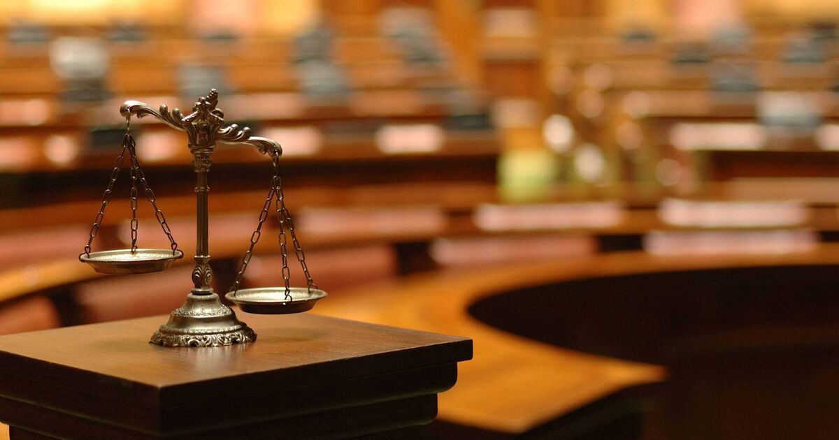 Allegation that man signing-on at Cork garda station threatened to behead member of public