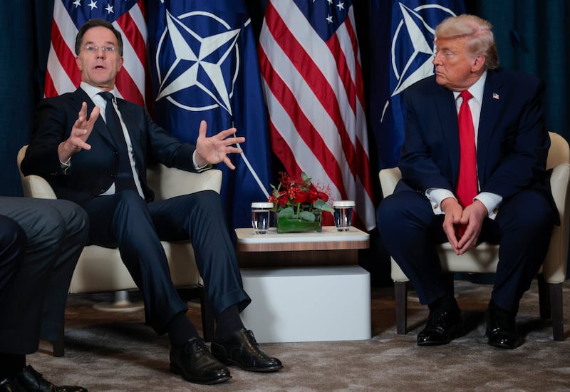 Trump listens as Nato secretary general Mark Rutte speaks during a bilateral meeting on the sidelines of the World Economic Forum on Wednesday. Photograph: Chip Somodevilla/Getty