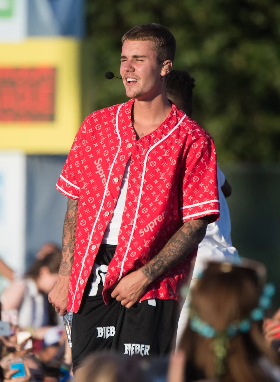 Justin performing outdoors