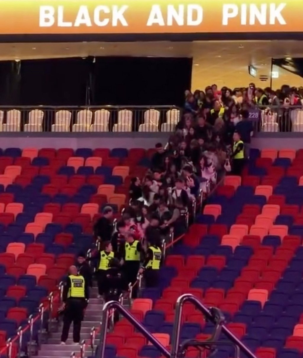 Security guards hold back eager fans ahead of Blackpink’s show on Saturday. Photo: Handout