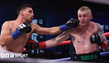 Carlos Ocampo and Callum Walsh aim punches at each other