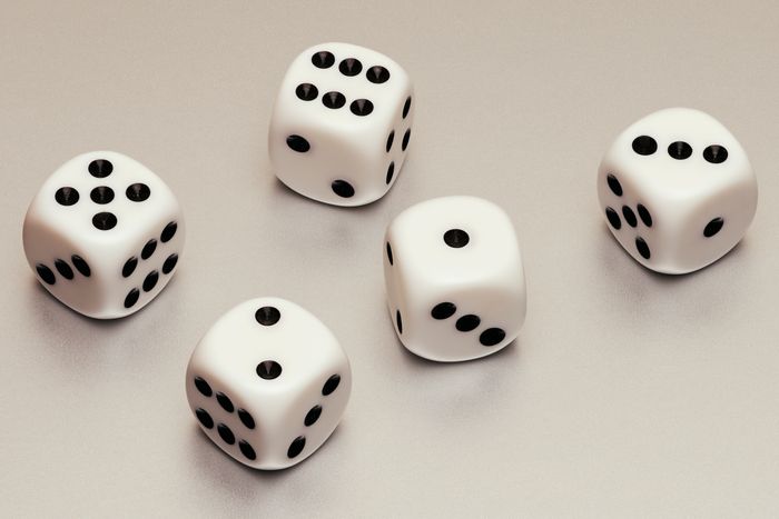 Still life five white dice and leather cup on white background