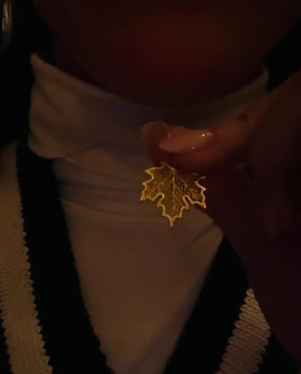 Katy Perry showed off a gold maple leaf necklace on social media. (Image via Instagram/@katyperry)