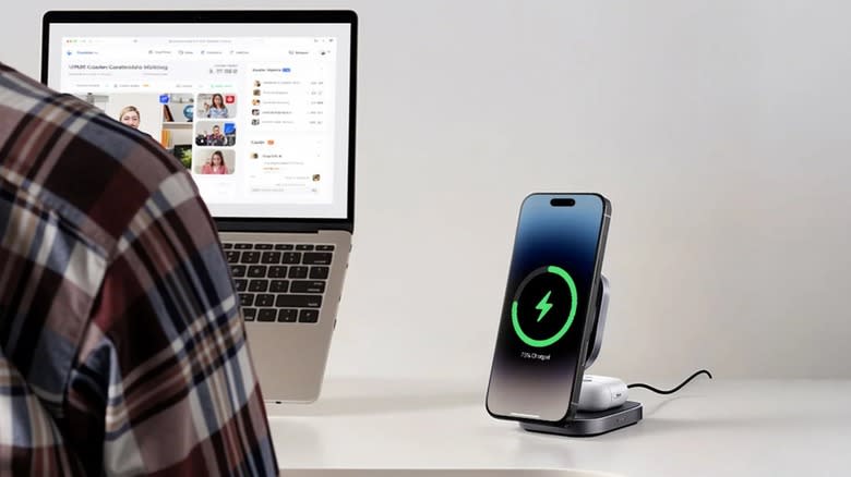 The Aukey MagFusion stand charging a phone and AirPods on a desk.
