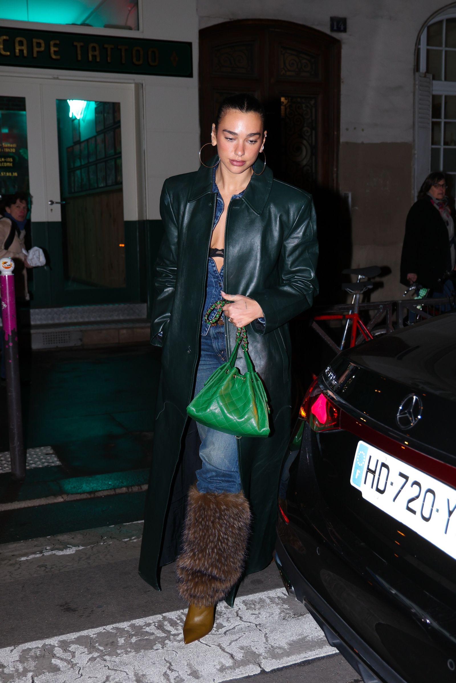 Dua Lipa and Callum Turner enjoy a stylish outing with Dua's younger brother in Paris