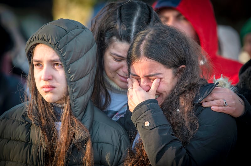 Bruna Fonseca's niece Maria Fonseca, friend Juliana Souza and cousin Marcela Fonseca at a vigil in memory of Bruna in Cork in January 2023. Photograph: Michael Mac Sweeney/Provision