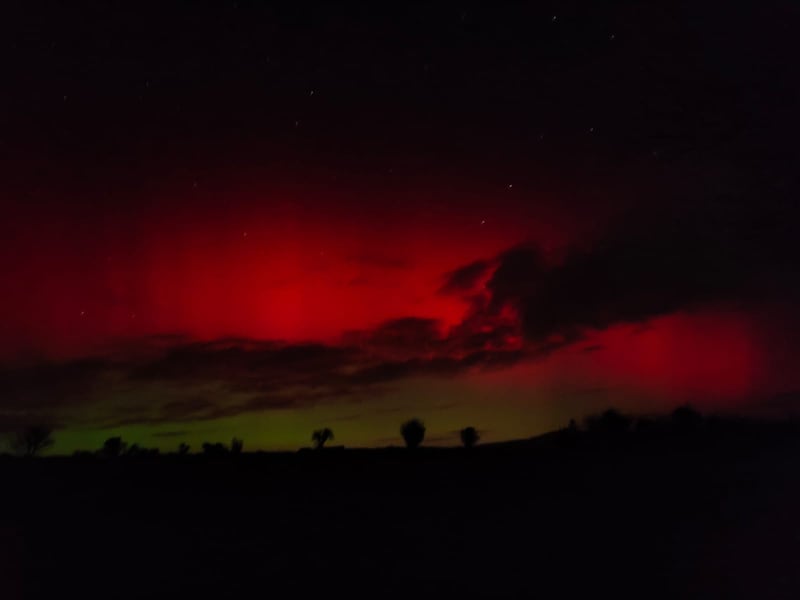 Red and green light in the sky above Tullogher, Co Kilkenny on Monday night. Photograph: Siobhán Kennedy
