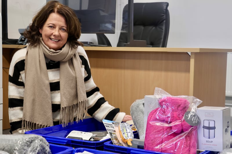 Máirín Ní Choisdealbha-Seoige with crates of emergency supplies for future storms. Photograph: Ronan McGreevy