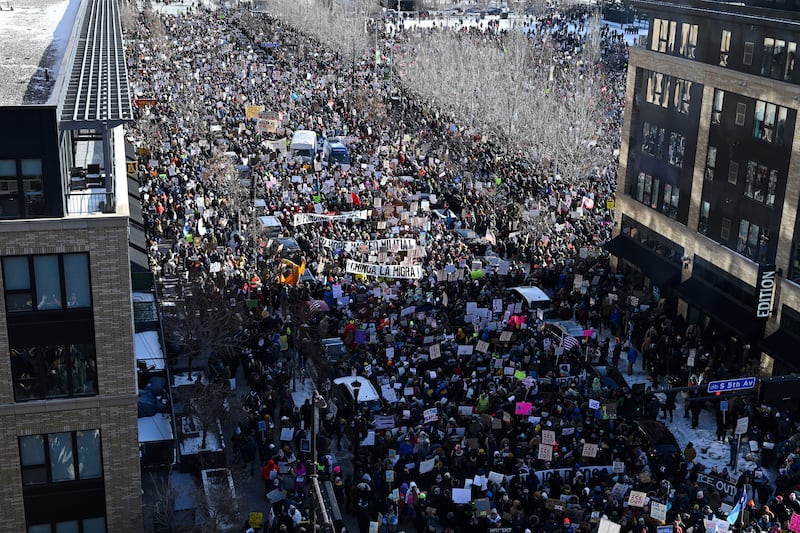 The day of protest drew large crowds in Minneapolis on Friday. Photograph: Stephen Maturen/Getty