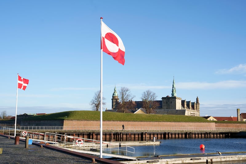 The Greenlandic flag with Kronborg Castle in the background in Elsinore, Denmark. Photograph: Keld Navntoft/Ritzau Scanpix/AFP via Getty Images