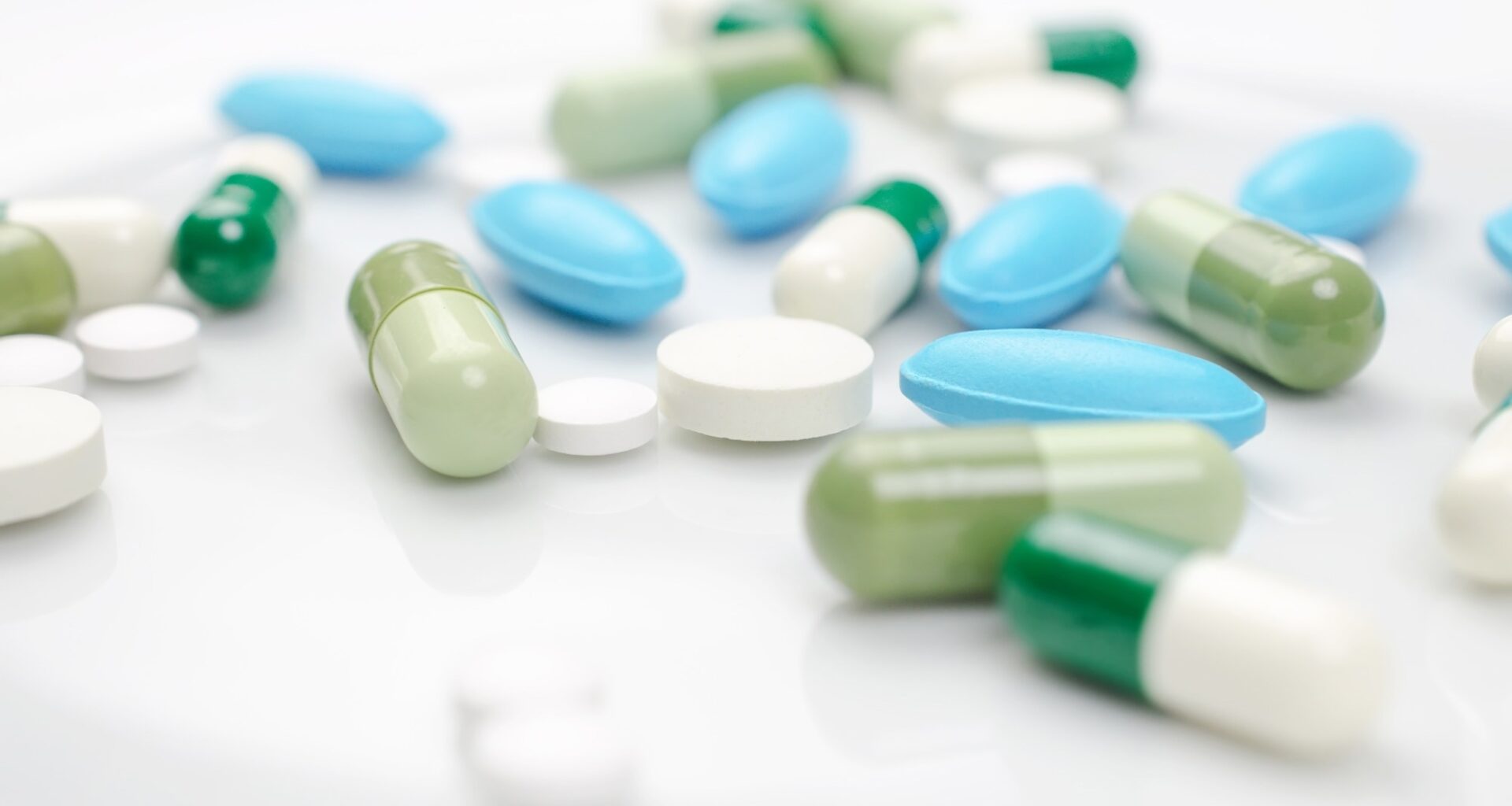 Blue and green pills