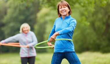 Senior women are doing exercise with hoop for fitness and coordination