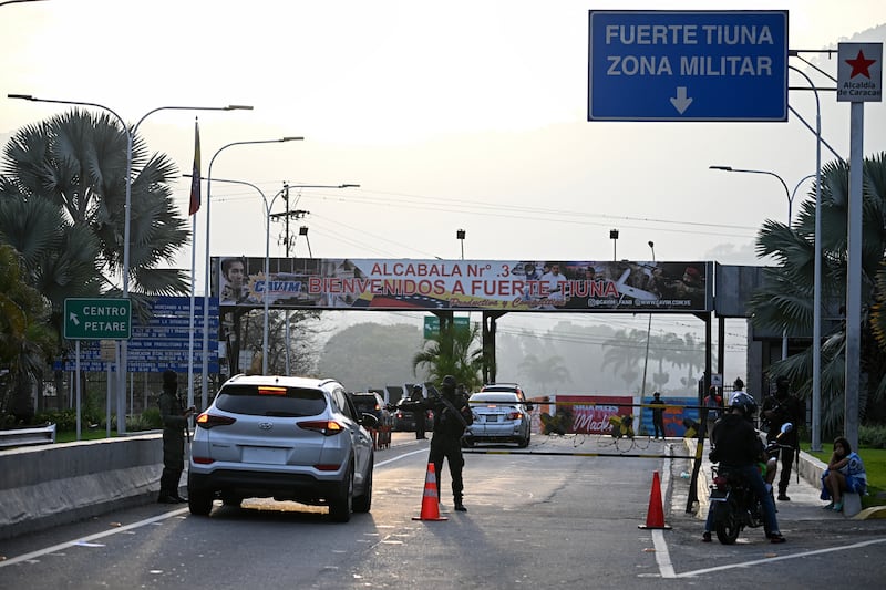Members of the Venezuelan national guard at an entrance to Fuerte Tiuna. Photograph: Federico Parra/AFP/Getty