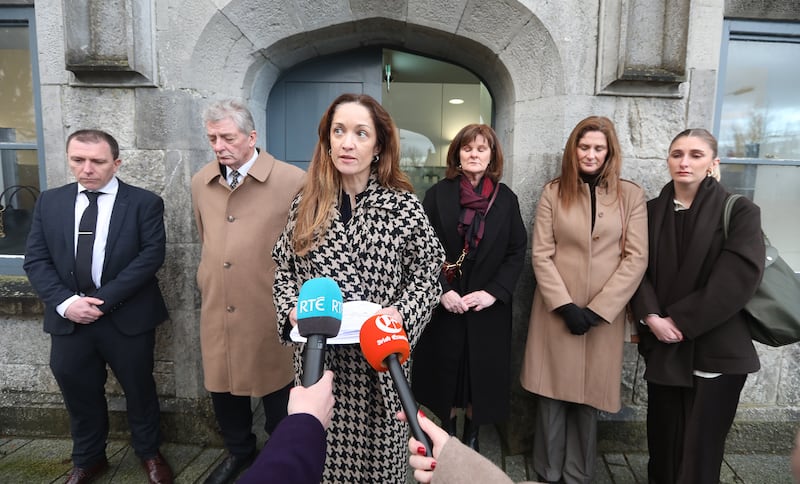 Scarlett Griffin O'Sullivan, solicitor of the family of Laura Liston, speaking outside the coroner's court in Kilmallock, next to Laura's husband Fergal Mannion, her father John and mother Fiona Liston, and sisters Jennifer and Sarah Liston. Photograph: Brendan Gleeson