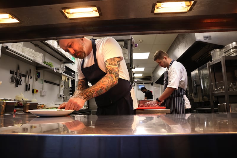 Chefs Mark Ahessy (left) and Lukasz Maslowski at work in The Old Spot