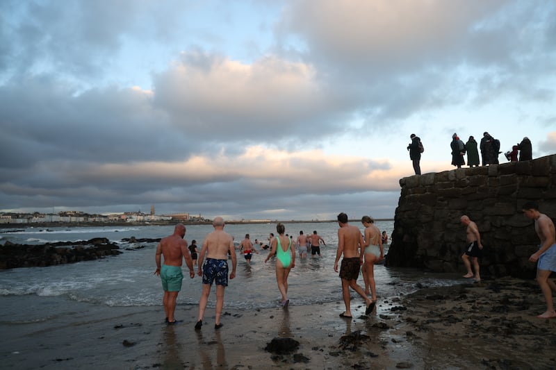 Swimmers enjoy a Christmas Day dip at Sandycove in South Co. Dublin. Photograph: Bryan O’Brien
