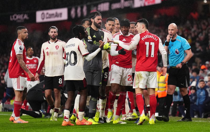 Players react to Arsenal's Gabriel Martinelli after he moved Liverpool's Conor Bradley (not pictured) off the pitch. Photograph: John Walton/PA