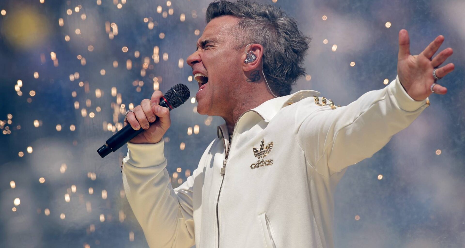 Robbie Williams surprise releases long-awaited new album 'BRITPOP'