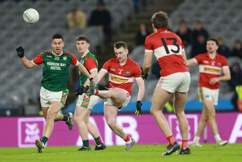Dingle’s Tom O’Sullivan kicks a point to level the game in extra time. Photograph: James Crombie/Inpho