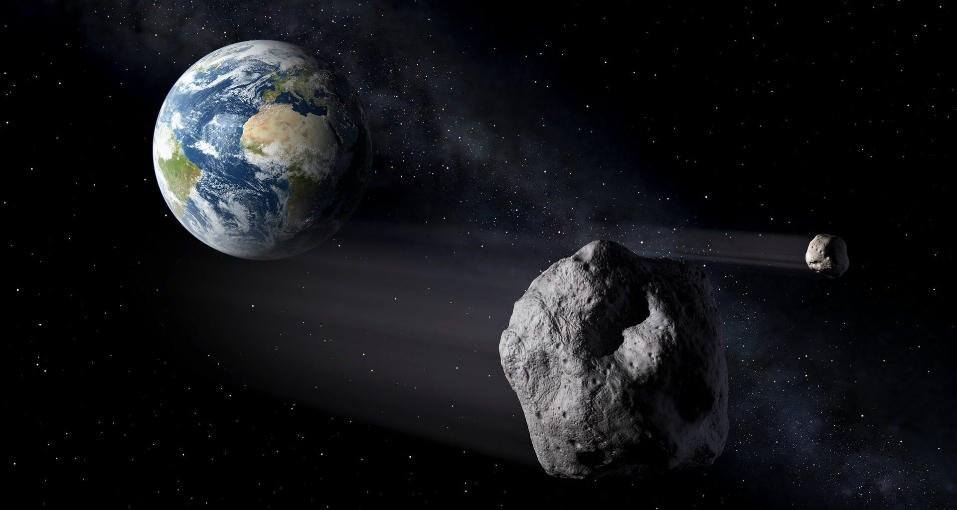 A twin asteroid system making a close pass to Earth. Credit: ESA/P.Carril
