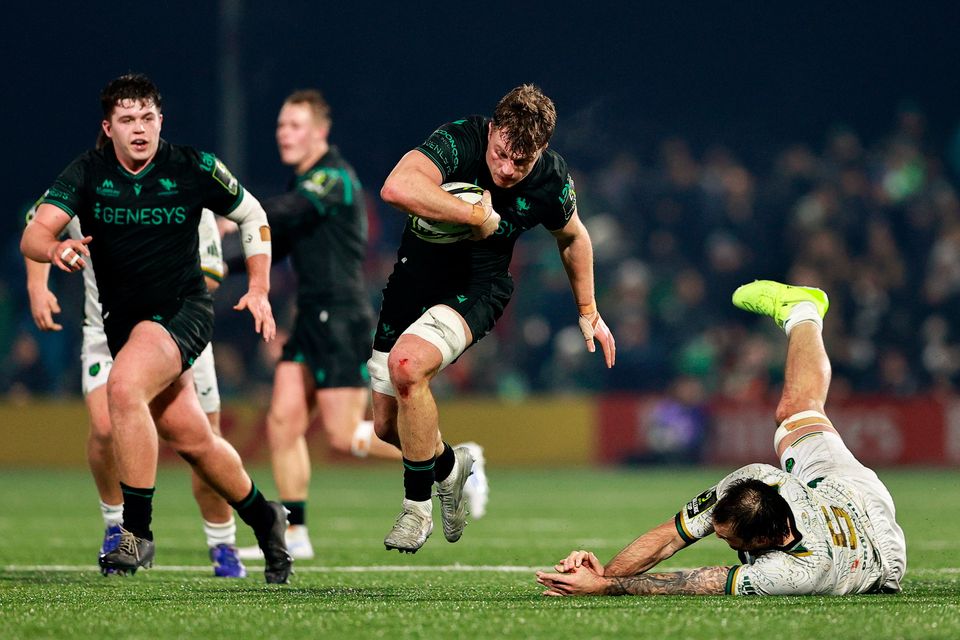 Cian Prendergast of Connacht evades the tackle of Lewis Bean of Montauban during the Challenge Cup match at Dexcom Stadium in Galway. Photo: Thomas Flinkow/Sportsfile