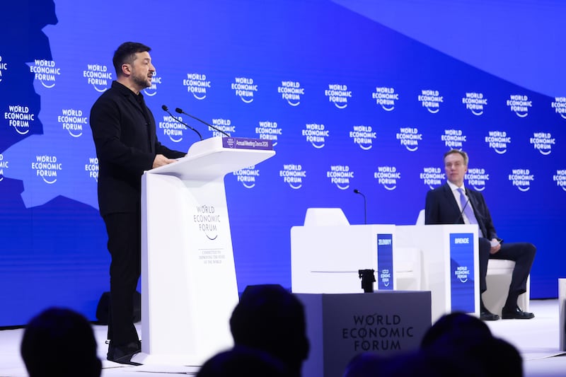 Ukraine's president Volodymyr Zelenskiy (left) addresses the World Economic Forum in Davos, Switzerland, on Thursday. Photograph: Krisztian Bocsi/Bloomberg