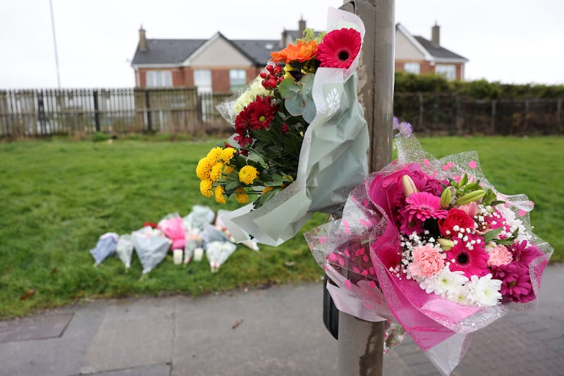 Flowers left at the pedestrian crossing where 16-year-old Grace Lynch was fatally injured as a result of being hit by a scrambler bike at Ratoath Road in Finglas.  Photograph: Alan Betson