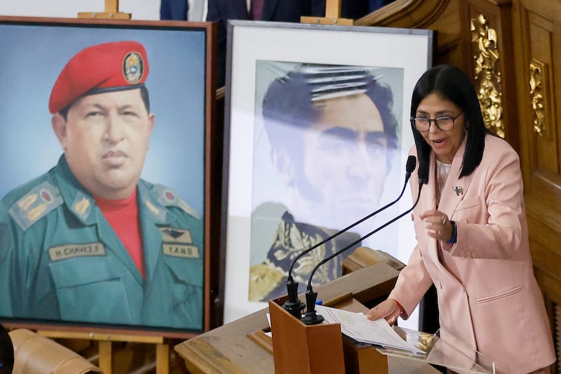 Venezuela's vice-president Delcy Rodríguez speaks alongside portraits of late Venezuelan president Hugo Chavez and the liberator Simon Bolivar during the presentation of the 2026 fiscal year budget at the National Congress in Caracas on December 4th. Photograph: Pedro Mattey/ AFP via Getty Images