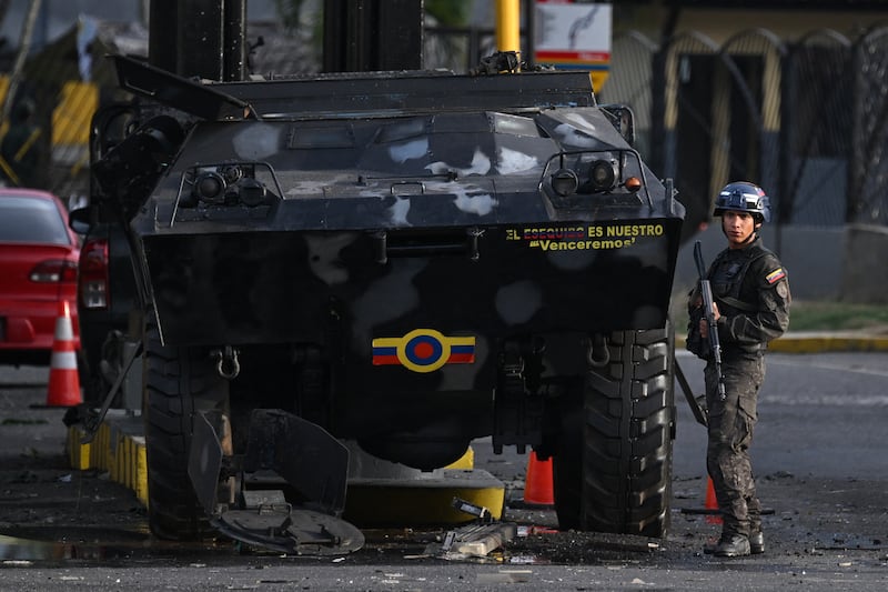 A member of the National Guard stands guard at Fuerte Tiuna, Venezuela's largest military complex, in Caracas on January 3rd, following a 'large scale strike' by the US on the South American country. Photograph: Federico Parra/ AFP via Getty Images