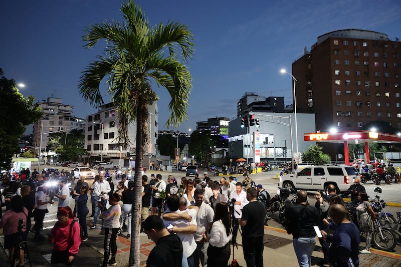Relatives of prisoners arrive for the release of political prisoners at El Helicoide in Caracas. Photograph: Jesús Vargas/Getty Images