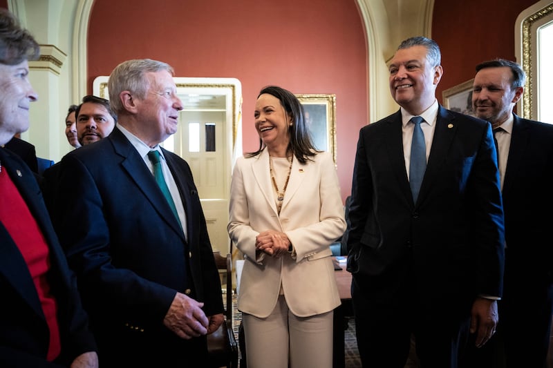 Maria Corina Machado speaks with US Senate minority whip Dick Durbin, a Democrat from Illinois, and other senators at the US Capitol. Photograph: Drew Angerer/AFP/Getty Images