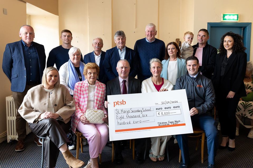 PTSB Carol Walsh trust presentations in St Michaels theatre. Front; Karen Dobbyn PTSB, Teresa Brradley, John Michael Porter principal St Marys school receives €8,600 from Ann Larkin with Niall Doyle  PTSB. Back; Billy O'Shea trustee, Eric Cummins, Helen Bradley, Michael Conlon former TSB HR, David Bradley, Joe Walsh, Ann Marie Cummins, Joey Kehoe,  Paul Cummins and Dawn McGrath PTSB manager. Photo; Mary Browne