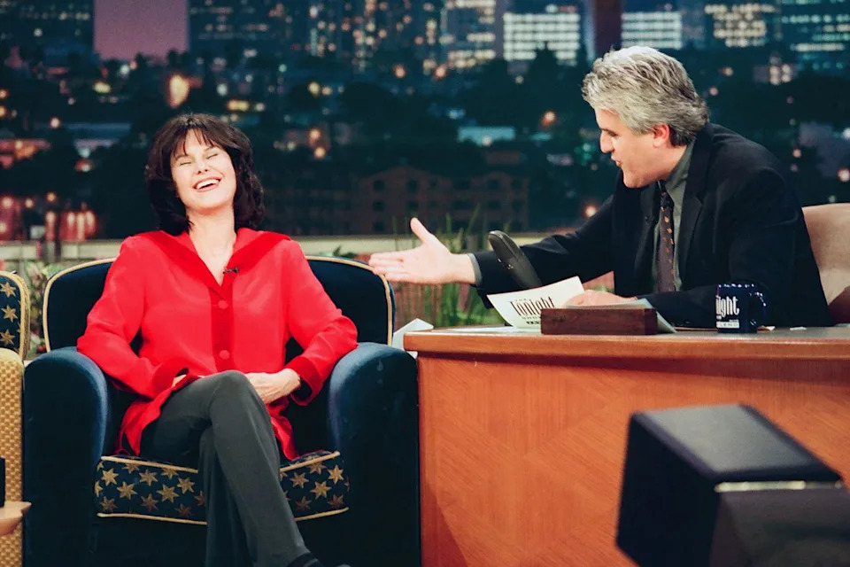 NBCU Photo Bank/NBCUniversal via Getty Mavis during an interview with host and husband Jay Leno on March 23, 1999