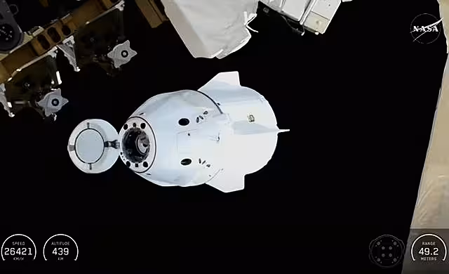 A capsule detaches from the ISS