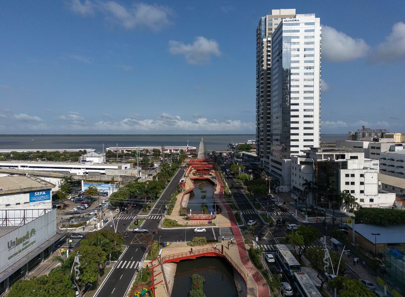 elevated linear park reclaims canal runing along brazilian city center