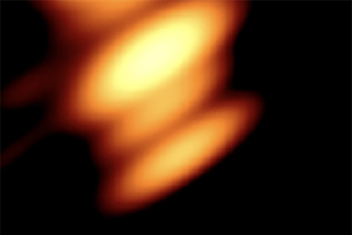 The first image of two black holes orbiting each other in quasar OJ287. Image shows radio light glowing gas around the black holes. Credit: Valtonen, Mauri et al., The Astrophysical Journal, 2025