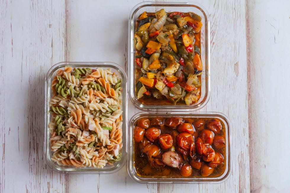 Hermetic glass containers of cooked food. Concept of batch-cooking concept of batchcooking and real food