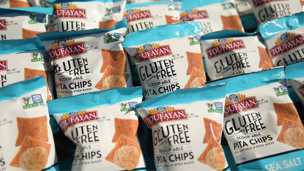 A selection of gluten free snack products on display, highlighting the growing demand for clearer i...