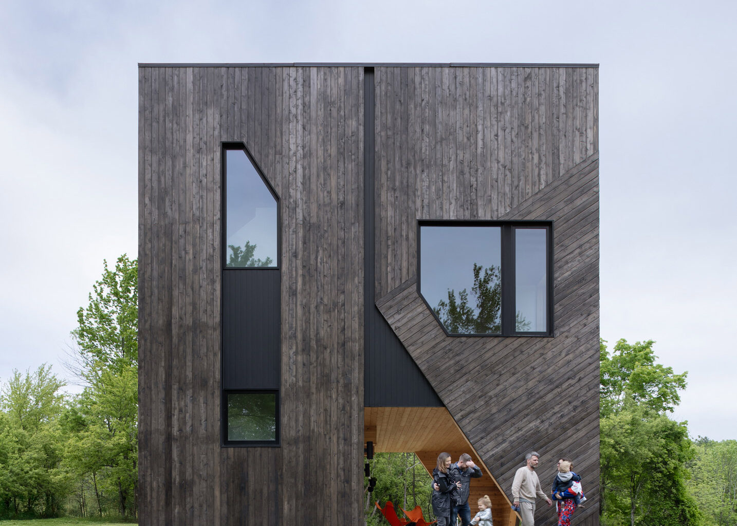 Forma lifts Hudson Valley cedar-clad cubic house on angled legs