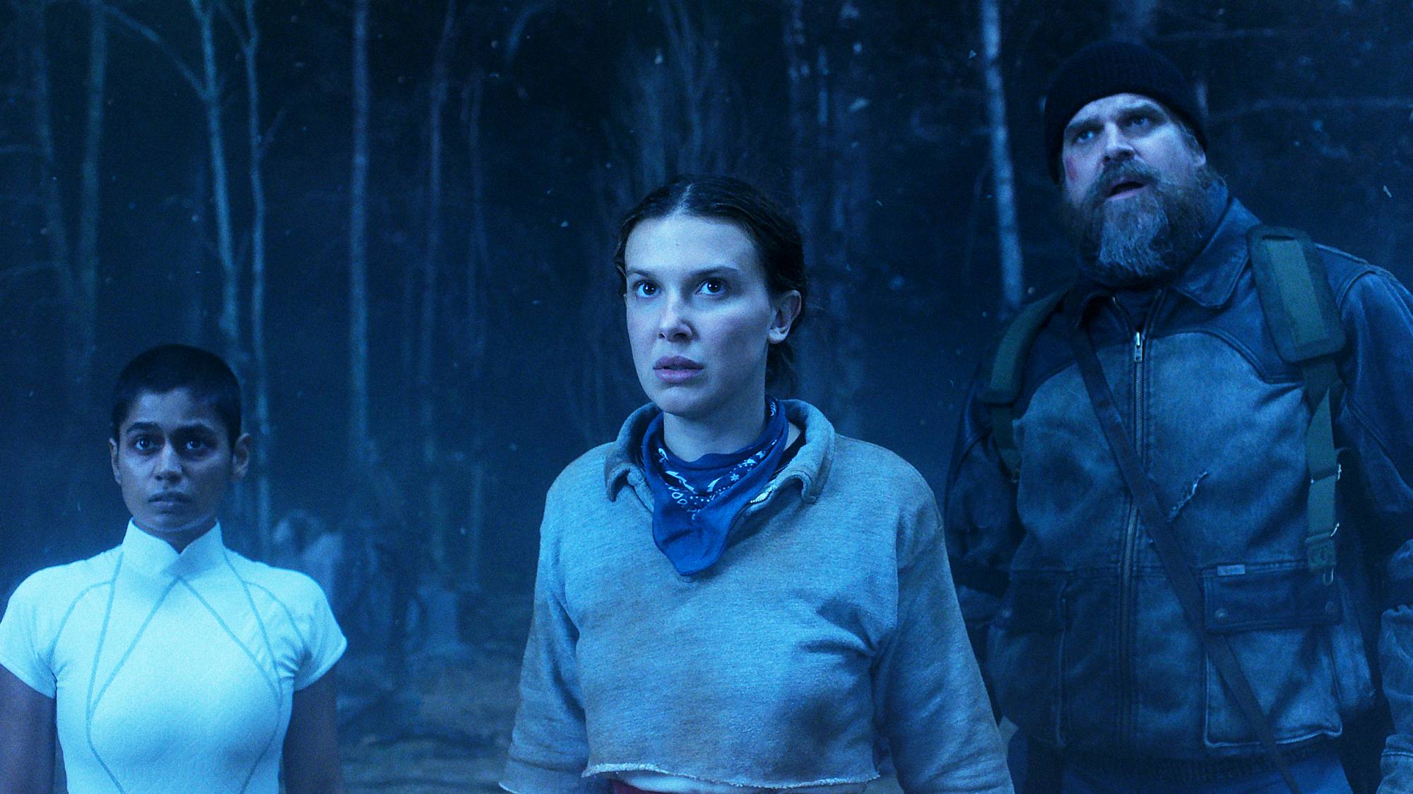 Linnea Berthelsen as Kali, Millie Bobby Brown as Eleven, and David Harbour as Jim Hopper in "Stranger Things" season 5 part 2