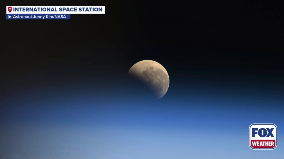 NASA astronauts Zena Cardman and Jonny Kim captured views of September's total lunar eclipse from the International Space Station. 