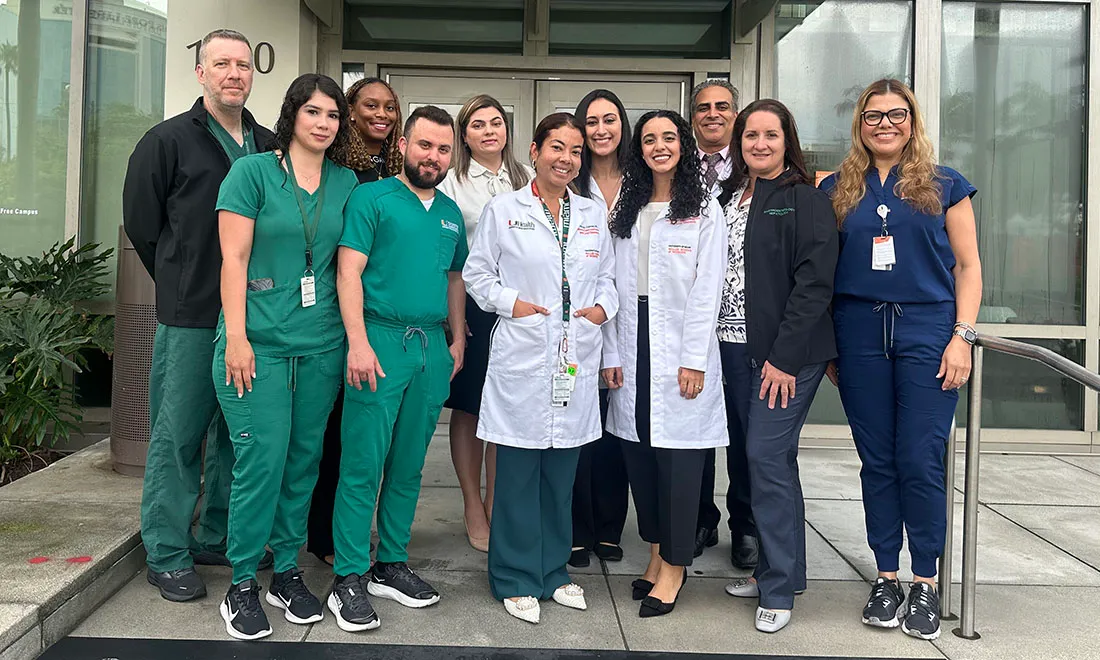 Dr. Oriana Damas  (front center) and Dr. Stephanie Ioannou (front row, third from right) with their IBD clinic team