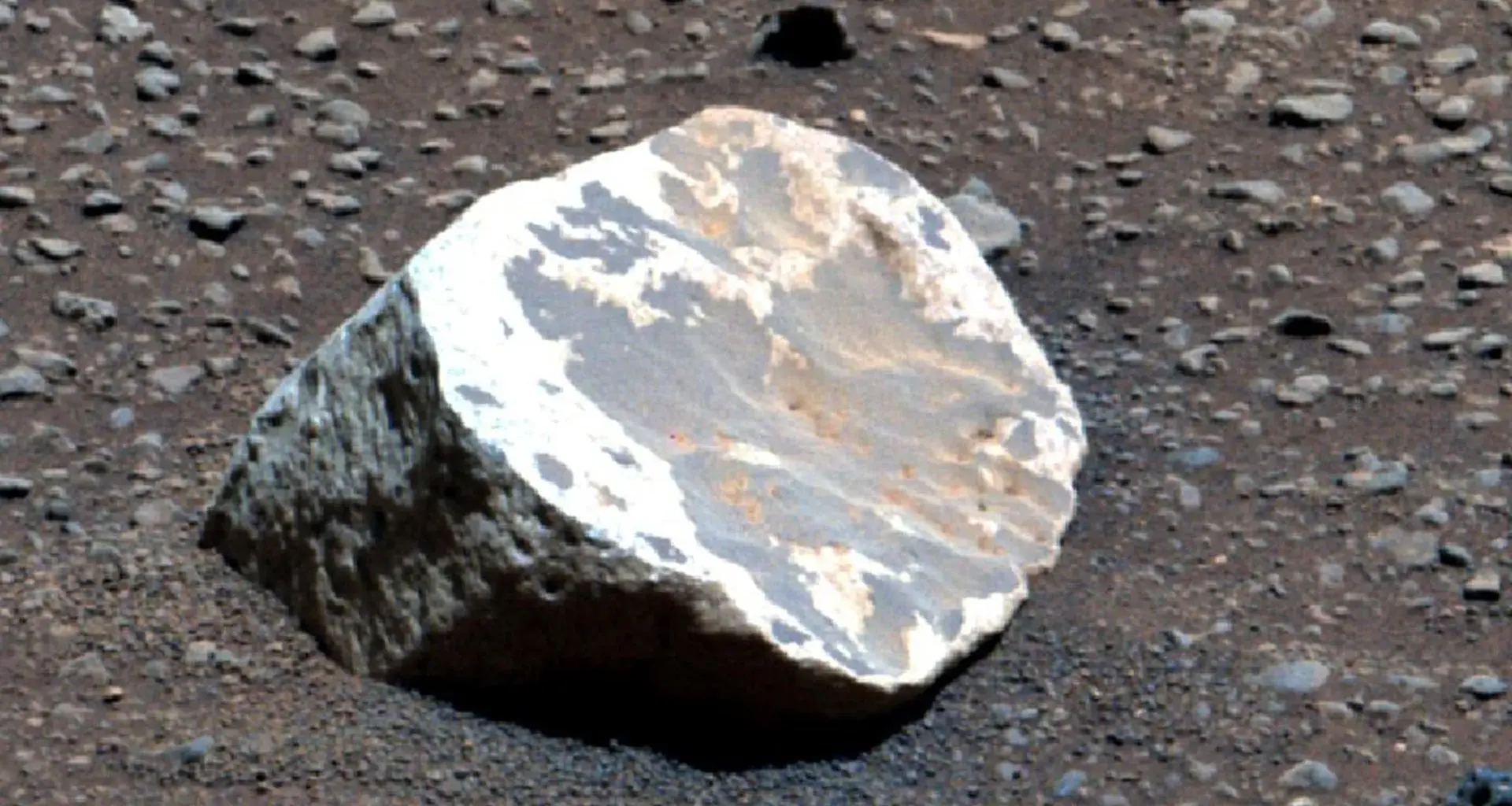 Strange white rocks on Mars hint at millions of years of rain