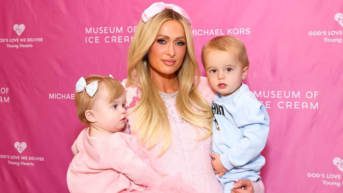 Paris Hilton carrying her babies.