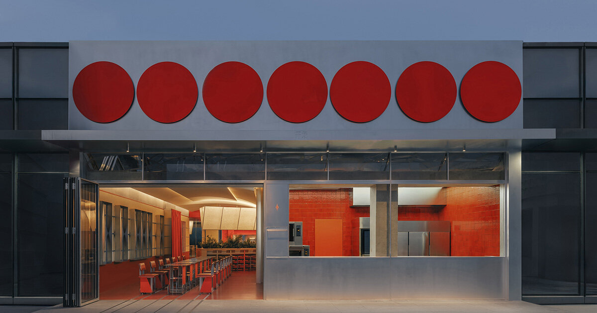 circular red panels line the facade of café by aptdotapt in china